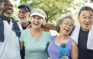 A group of happy, active seniors laugh and hang out