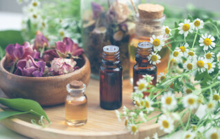 An arrangement of flowers and essential oils